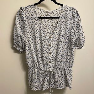Sienna Sky puff sleeve/ peplum top